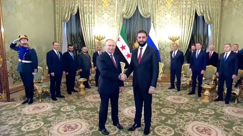 suriye gecici cumhurbaskani sara ilk kez moskovada putinle gorustu gundemde rus asker usleri ve esadin iadesi var cFifDbOh.jpg